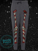 Load image into Gallery viewer, Candy Cane Skeleton Joggers
